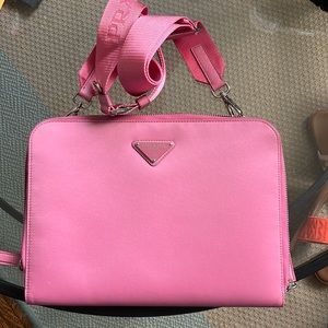 Prada iPad case with strap.